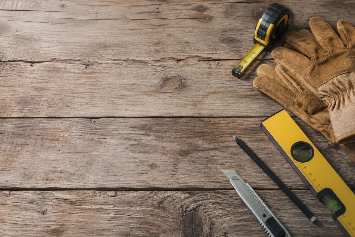 Tools laid out on a work surface before a job starts