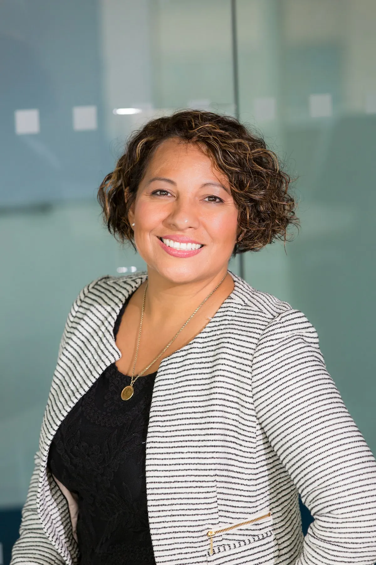 Portrait of Diane Okafor, licensed insurance adjuster and Onward expert reviewer